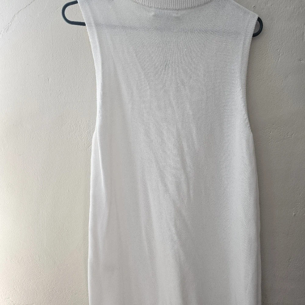Revolve Milly Cotton-Blend Tunic with Ribbed Neckline and Hem Turtleneck - Picture 8 of 10